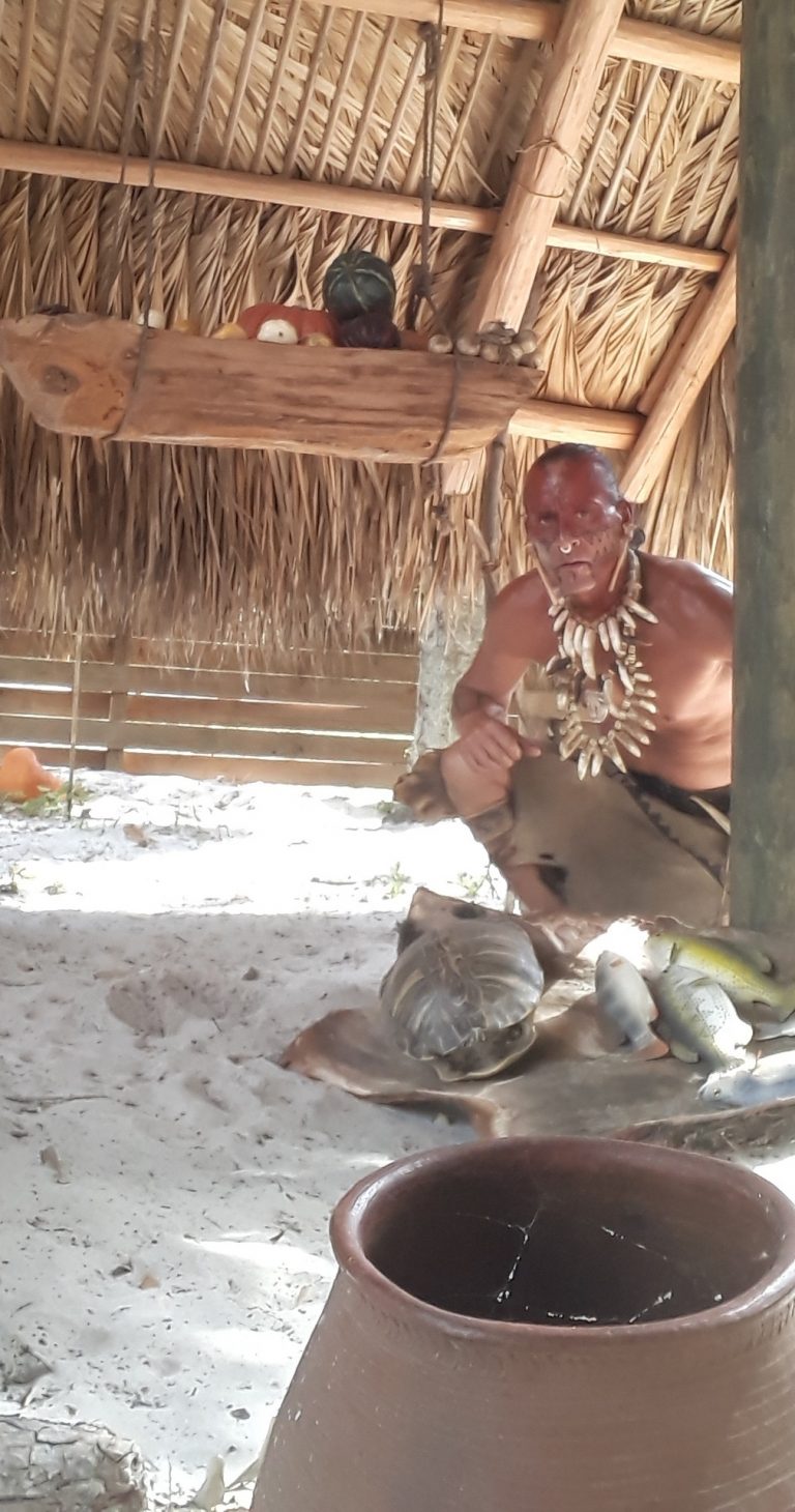 gonativenow_jororo-village-walkthrough-show-native-american-man-shells-village Gonativenow Jororo Village Walkthrough Show Native American Man Shells Village E
