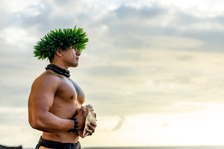 Okrluau Feast Fire Luau General Seating Outrigge Man Leaf Crown Seashell Sunset