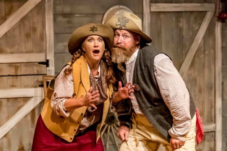Two actors in western costumes express surprise on stage. Theshepherdofthehills Branson S Whodunnit Hoedown Murder Myste Murder Mystery Dinner Show Actors